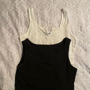 Pack of 2. Shein tank tops. V cut. black and white. size s